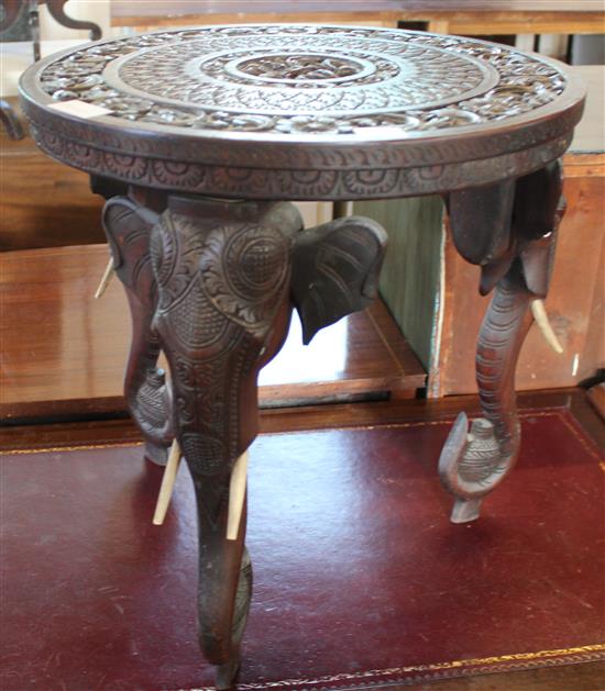 Circular carved elephant table
